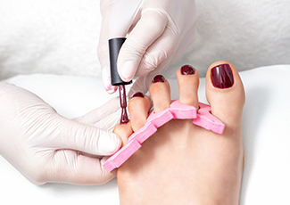 A woman getting a pedicure
