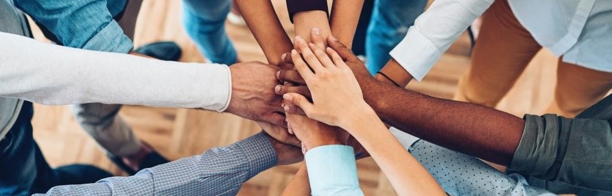 Hands joining together