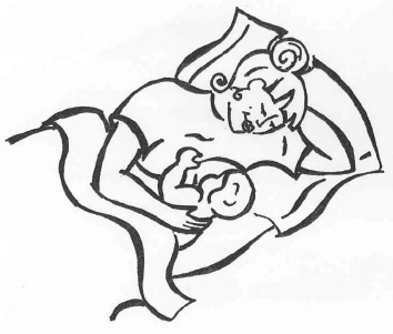 parent breastfeeding while laying sideways in bed